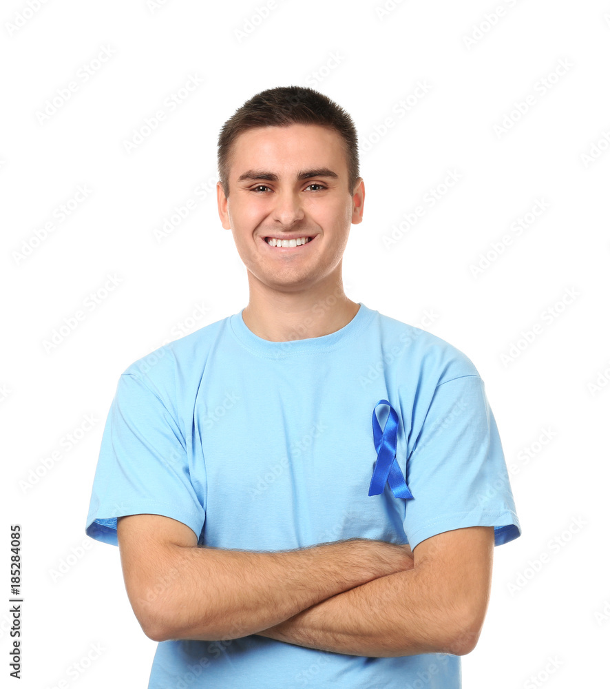 Young man wearing t-shirt with blue ribbon on white background. Prostate cancer awareness concept