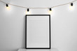 © Africa Studio - Mockup of blank frame with garland on light background