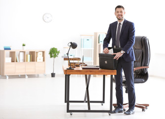 Wall Mural - Young male notary in office