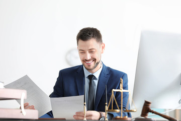 Wall Mural - Young male notary working in office