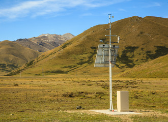 Solar Power Panel supplies energy to monitoring system in remote area.