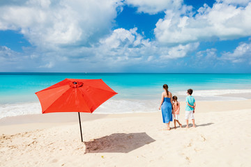 Wall Mural - mother and kids at tropical beach