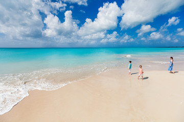 Wall Mural - mother and kids at tropical beach