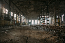 Dark Creepy Ruins Of Demolished Abandoned Large Industrial Warehouse Or Hangar Of Soviet Factory
