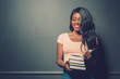 © fotofabrika - beautiful female african american university student portrait