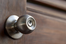 Stainless Door Knob And Keyhole On Old Wooden Door, Shallow Depth Of Field