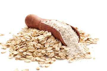 Wall Mural - Pile of oat wholegrain flour in spoon