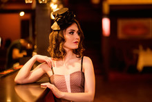 Beautiful Young Girl In The Style Of The Moulin Rouge Near The Bar