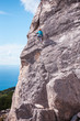 © zhukovvvlad - A rock climber on a wall.