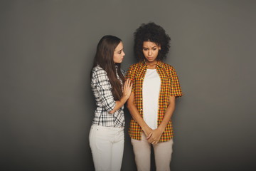 Wall Mural - Woman hugging her depressed friend