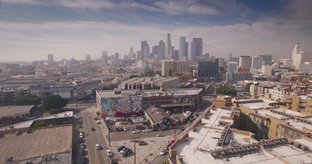 Aufkleber - Aerial view Arts district downtown Los Angeles skyline flyover 4K