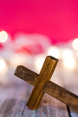 Wall Mural - Holy Christian Wooden Cross on an Abstract Red Background