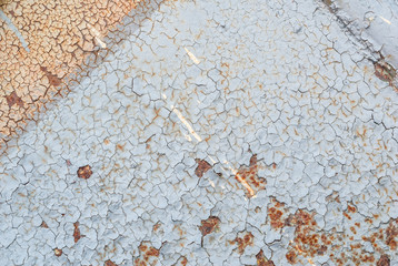 Wall Mural - surface of rusty iron with remnants of old paint, chipped paint, grey texture, background