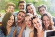 © jackfrog - Group of young people taking a selfie outside