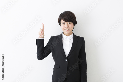 ひらめきのポーズをするビジネスウーマン Stock 写真 Adobe Stock