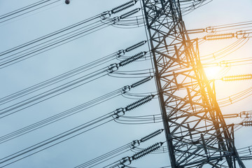 Electricity concept. Close up high voltage power lines station.