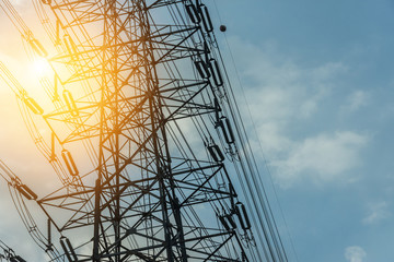 Electricity concept. Close up high voltage power lines station.