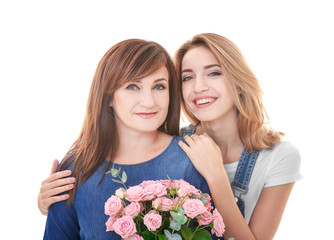 Canvas Print - Attractive young woman with her mother on white background