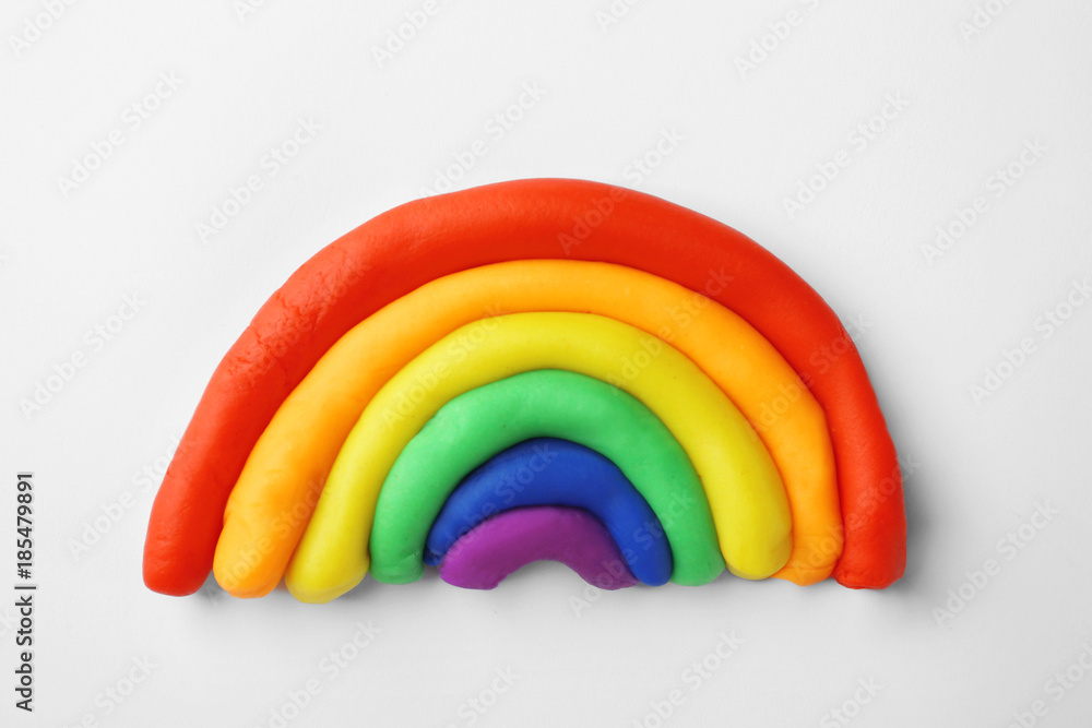 Plasticine rainbow on white background