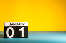 January 1st. Day 1 Of January Month, Calendar On Yellow Background. Winter Time. Empty Space For Text
