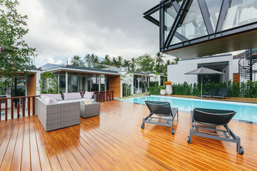 Tropical summer luxury villa interior outdoor. Palm trees, sunny day