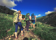© lkoimages - Hiking in beautiful mountains. Group of hikers enjoy the weather