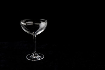 Wine glass on the black background