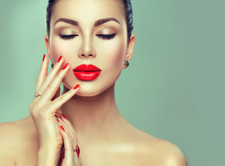 Wall Mural - beautiful fashion sexy woman with red lipstick and red nails