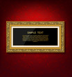 © Samran - Gold vintage picture frame on red wall