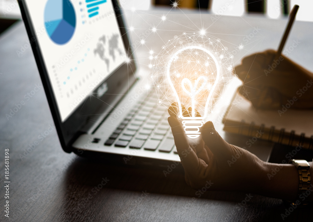 Business women hand holding light bulb, concept of new ideas with ...