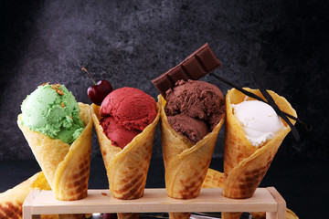 Canvas Print - Set of ice cream scoops of different colors and flavours with berries, nuts and fruits