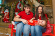 © guardalex - Happy family in Christmas Studio