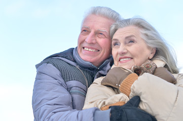 Wall Mural - senior couple at winter outdoors