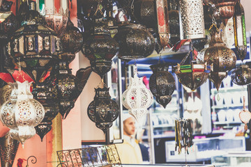 Wall Mural - Shining moroccan metal lamps and souvenirs in the shop in medina of Marrakech, Morocco