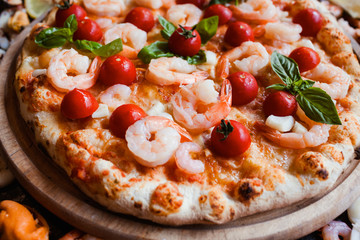 Wall Mural - Seafood pizza with shrimps and tomatoes. Tasty mediterranean style food concept