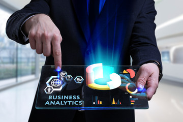 business, technology, internet and network concept. young businessman working on a virtual screen of