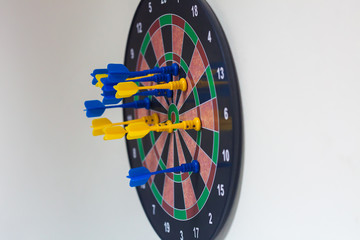 closeup of arrow in magnetic darts game