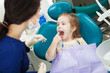 © Ilshat - Child at dentist office sits in comforatble chair