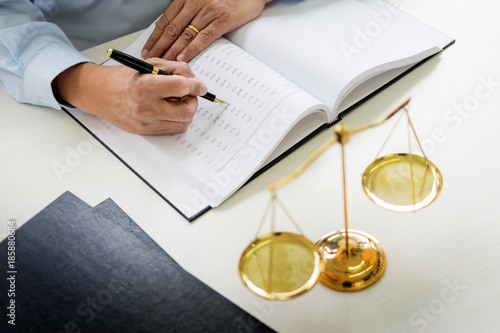 Fotografija gavel and soundblock of justice law and lawyer working on wooden desk background