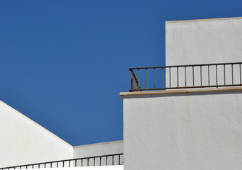 white terraces and blue sky