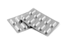 Medicine Pills In Aluminum Foil Strip Isolated On White Background.
