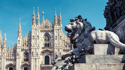 Wall Mural - Piazza del Duomo in Milan, Italy. Panorama of Milan cathedral and lion sculpture. 