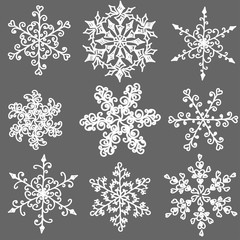 Wall Mural - A set of hand-drawn black-and-white snowflake