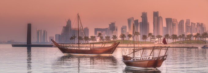 Wall Mural - Traditional Arabic Dhow boats in Doha harbour, Qatar