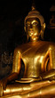 Large Golden Buddha Statue at Loha Prasart temple complex in Bangkok