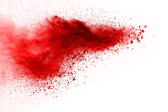 abstract powder splatted background. red powder explosion on black background. colored cloud. colorf