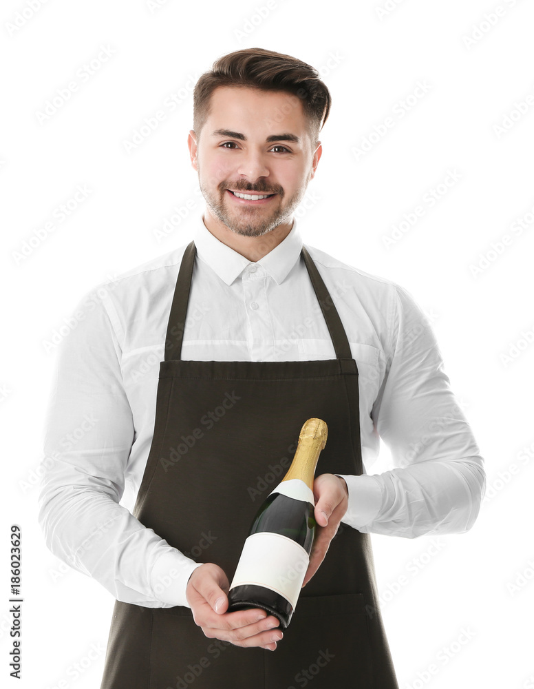 Waiter holding bottle of champagne on white background