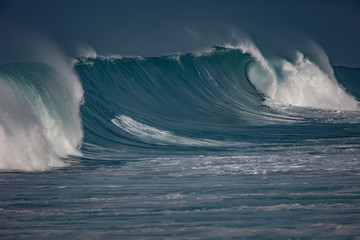 Wall Mural - huge waves crashing in ocean. seascape environment background. water texture with foam and splashes.