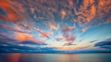 Fototapeta Niebo - Beautiful Sunset at Lake Superior with Boat