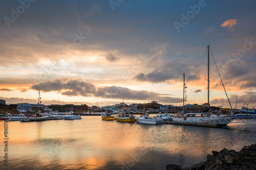 Stykkisholmur harbour at sunset. Stykkisholmur is a town situated in the west...